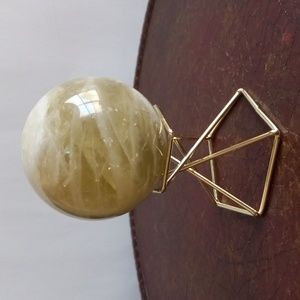 Citrine and cracked ice crystal sphere.